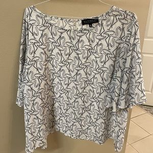 Flamingo blouse by Eloquii